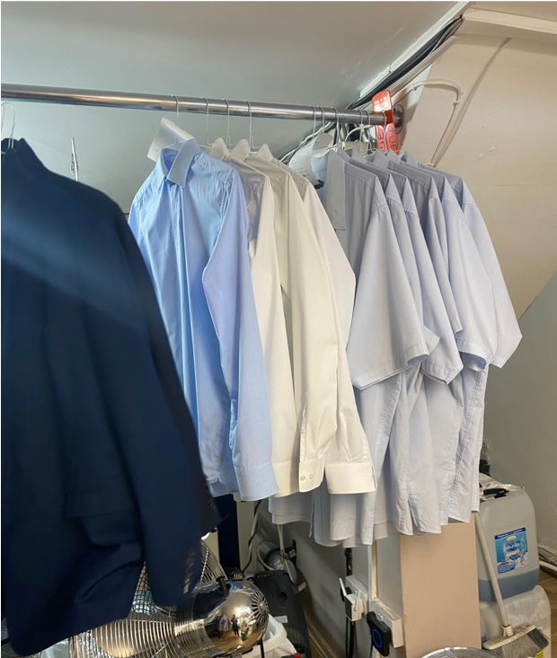 dry cleaning a shirt cost