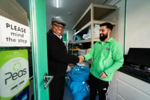 customers dropping off clothes for dry cleaning in kings cross